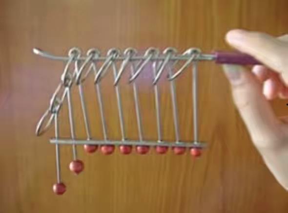 九连环解法视频,巧手解锁传统智力游戏之谜